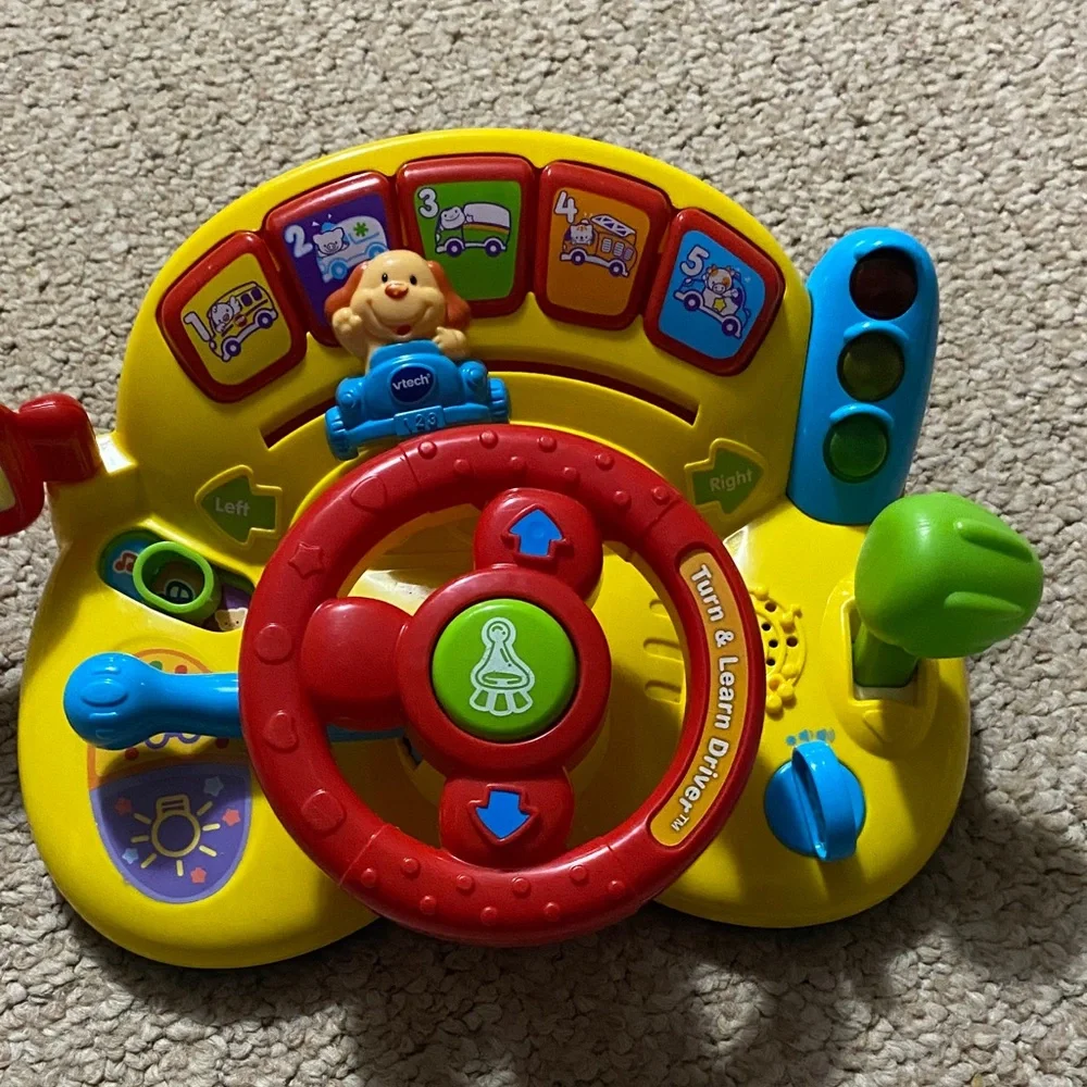 Vtech  Turn & Learn Driver steering wheel toy w music, sounds, songs , learning